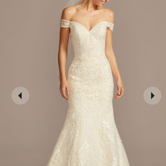 Brand new Oleg Cassini off the shoulder beautiful beaded Ivory wedding dress.